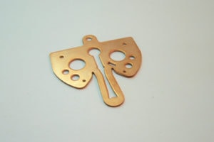 Metal stamping made of C220 commercial Bronze soft temper.